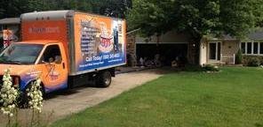 Mold Removal Truck Parked Near Lawn