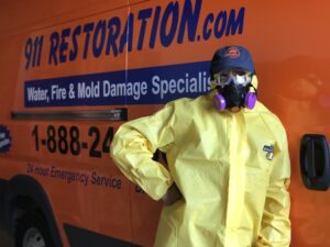 911 restoration tech with a hazmat suit on